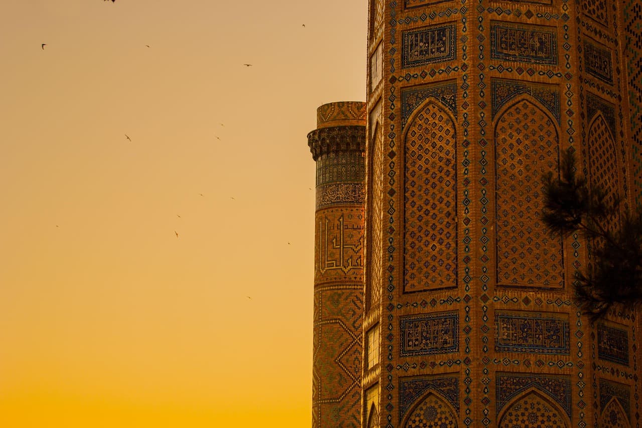 Tiled minarets at sunset in Samarkand, Uzbekistan