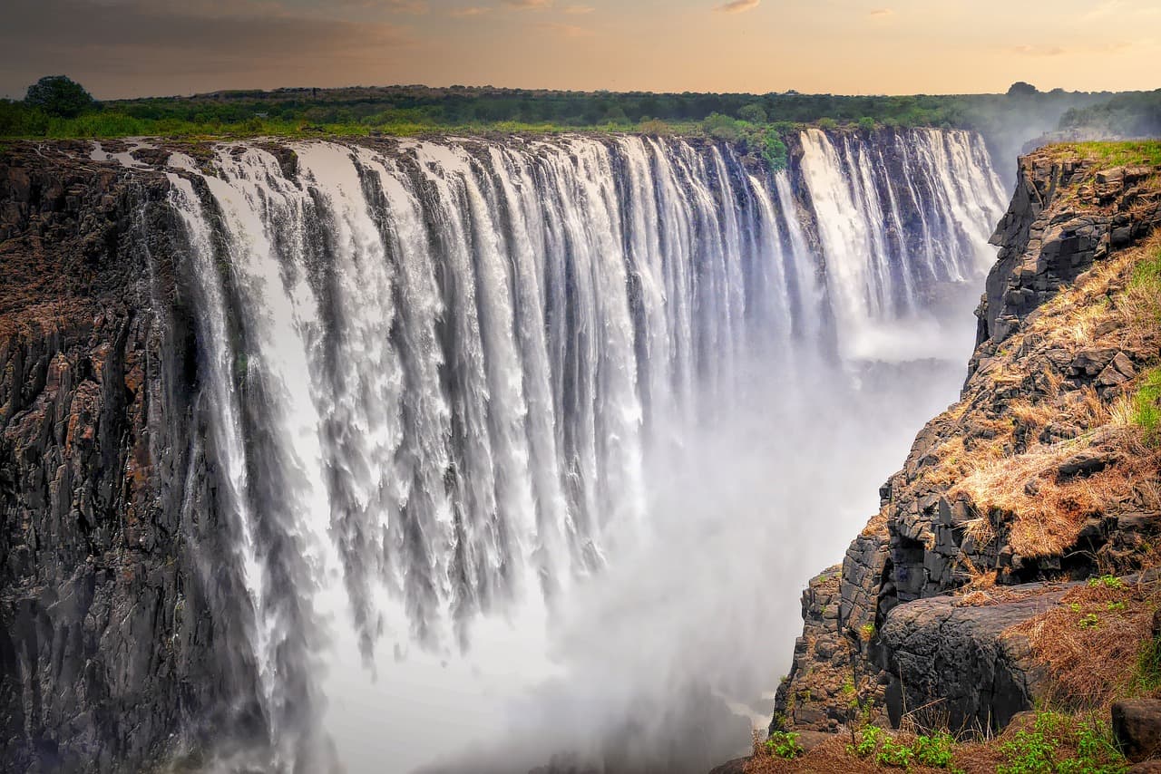 The long curtain of Victoria Falls dropping into its gorge, Zimbabwe